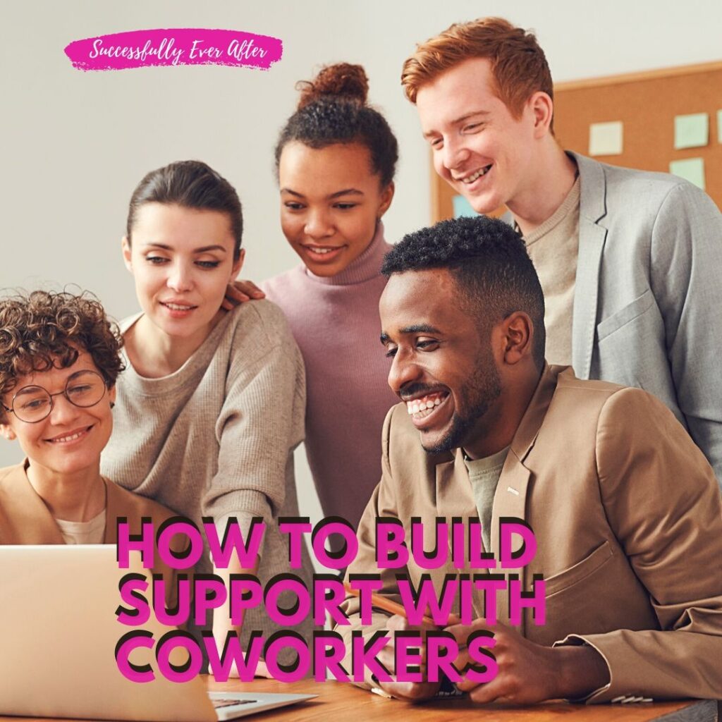 Group of male and female coworkers sitting around a computer.