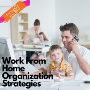 Man working from home with child in lap